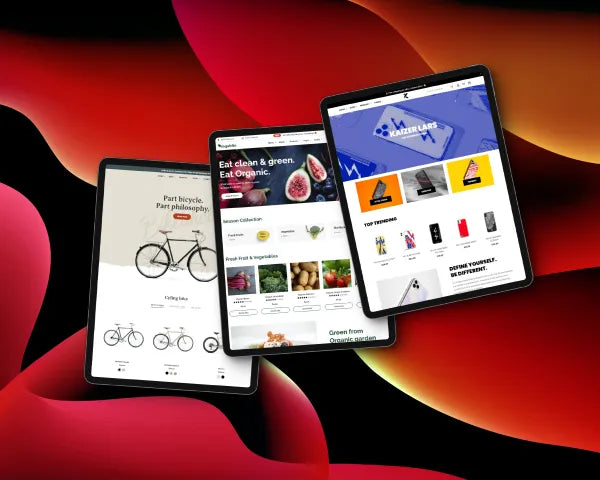Three tablets showcasing Shopify stores